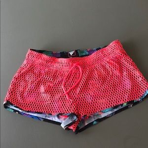 Adidas athletics shorts. Super fun color.